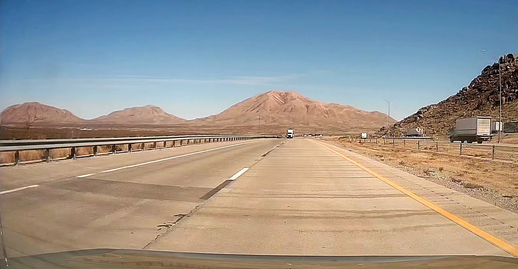 Open Texas highway and mountain landscape